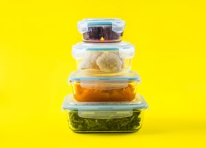 Meal prep concept. Glass airtight containers with cooked food veggies