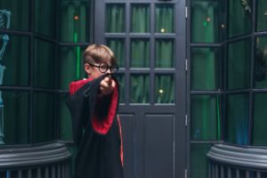 Harry Potter cosplay concept. Moment of magic wand action